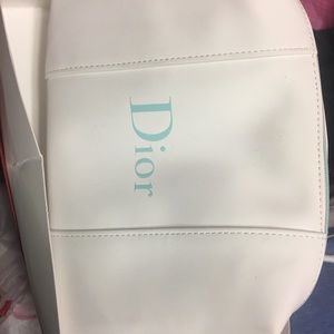 Color white Dior make up pouch